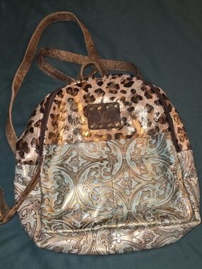 Keep It Gypsy, Metallic Leopard Print Cowhide And Tooled Leather Backpack